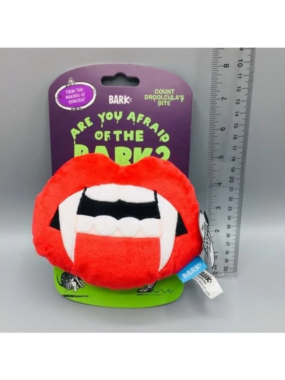 BARK Count Droolcula’s Bite Plush Dog Toy Plush squeaker Lips Spiky ball on the
